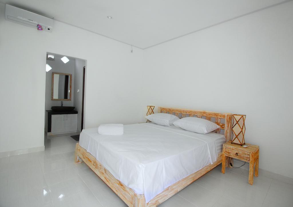 Andy Guesthouse Canggu Buitenkant foto