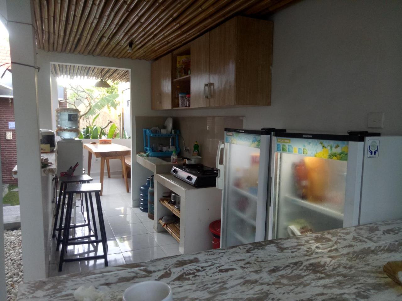 Andy Guesthouse Canggu Buitenkant foto